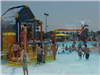 Kids playing in the Splash area of the Aquatic Center