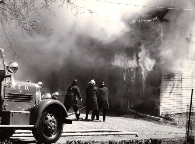 Firefighters Fighting House Fire